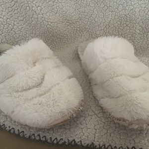 Well loved white cream furry slides